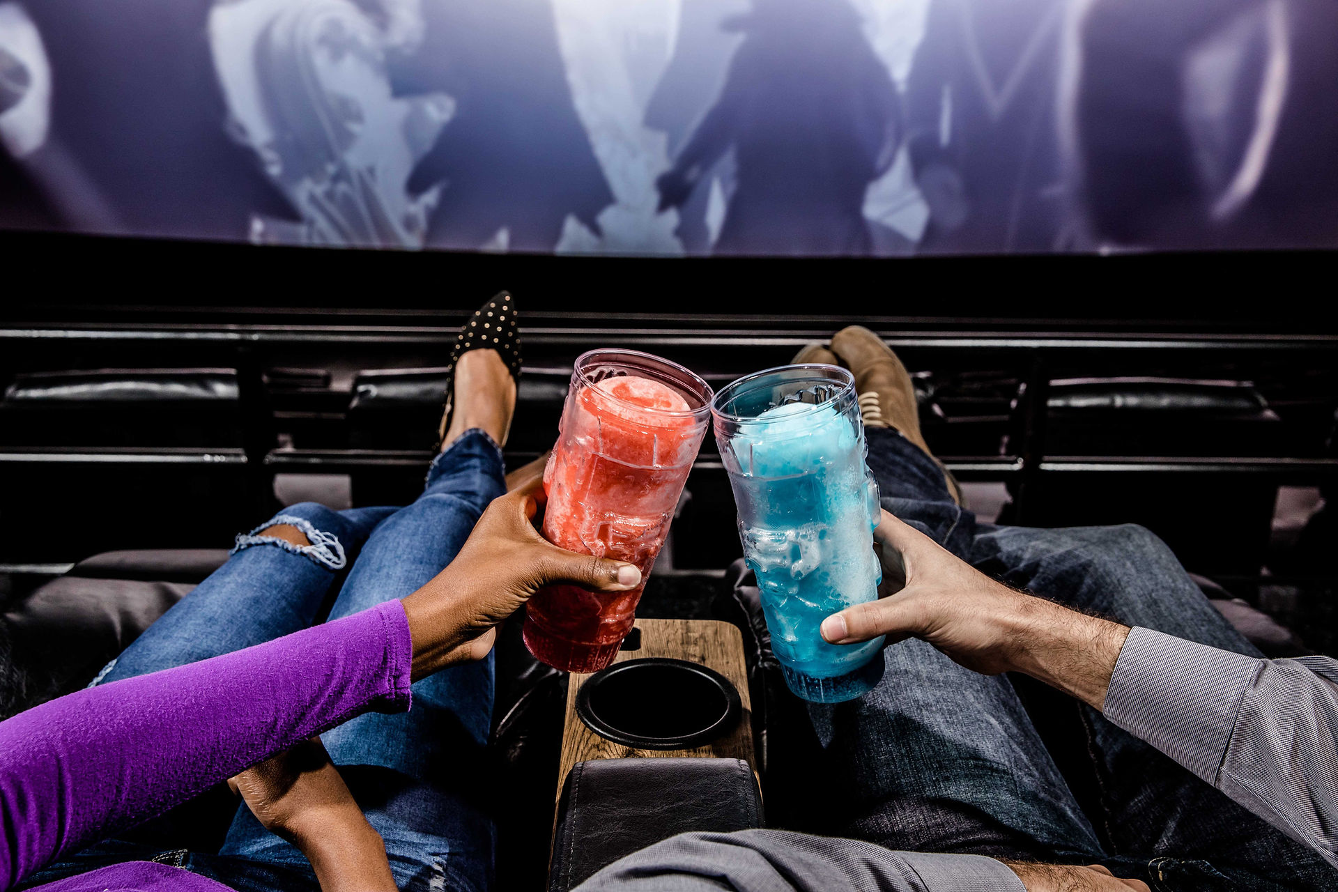two people with icees at imax theater