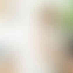 woman smiling at camera while designing