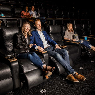 couple watching a movie in a theater