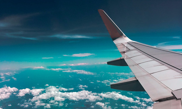 airplane-wing-towards-clouds-731217.jpg