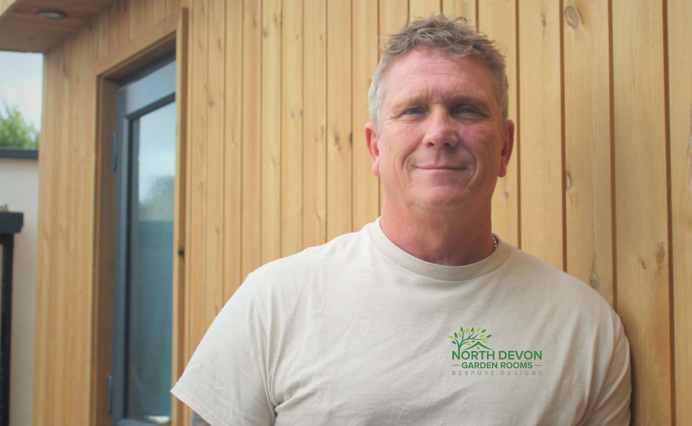 John portrait in front of Smith GR.jpg