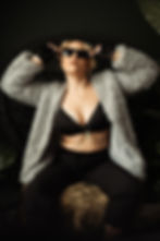Flirty Boudoir Photographer wearing an outfit inspired by Ken