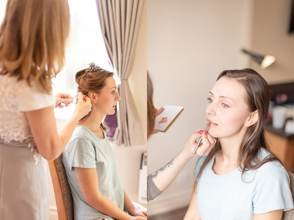 bride getting makeup and hair done on her wedding day