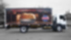 Side view of Taut Liners truck body showing body ready for loading.