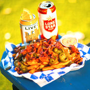 Crispy french fries covered in queso, bacon, jalapeños with ketchup and chipotle aioli.