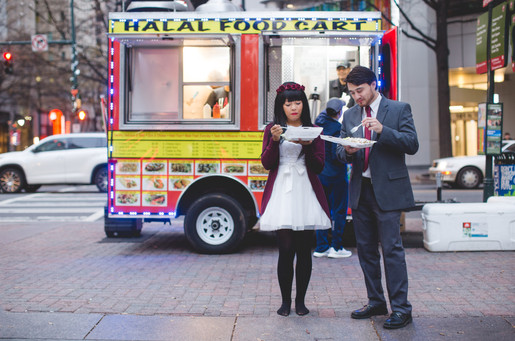 Bride and groom enjoy foot cart in Charlotte