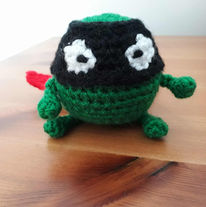 a crochet evil pea from the supertato books