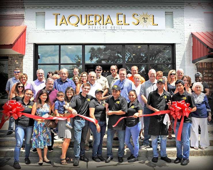 Staff and friends at the ribbon cutting