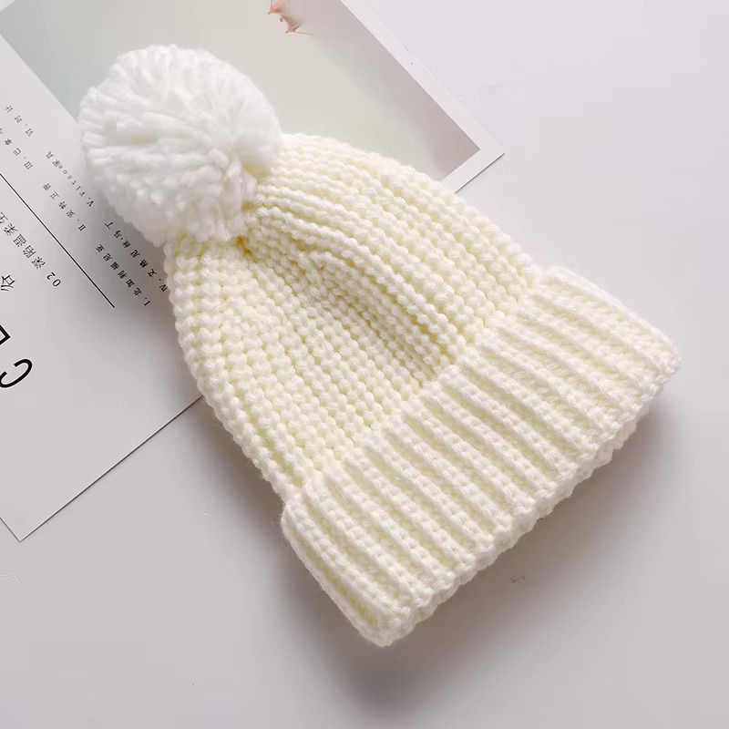 <img src="personalized-knit-hat.jpg" alt="Personalized knit hat with name embroidery in beige, mustard, and white colors">
