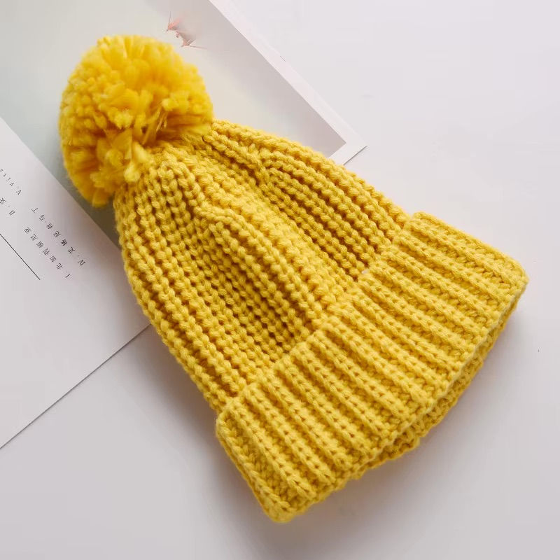 <img src="personalized-knit-hat.jpg" alt="Personalized knit hat with name embroidery in beige, mustard, and white colors">