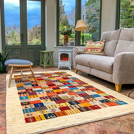 A Bright Gabbeh Rug In A Scenic Orangery