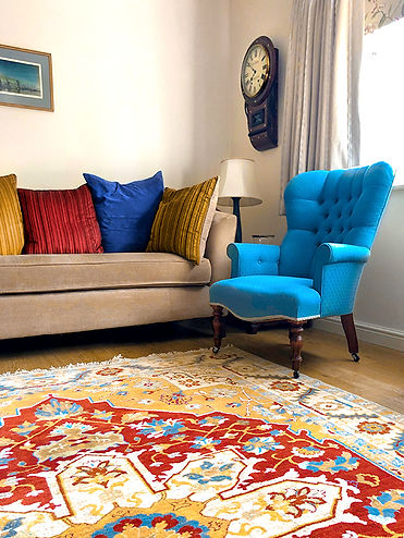 A Very Bright Red Gold And Blue Persian Rug