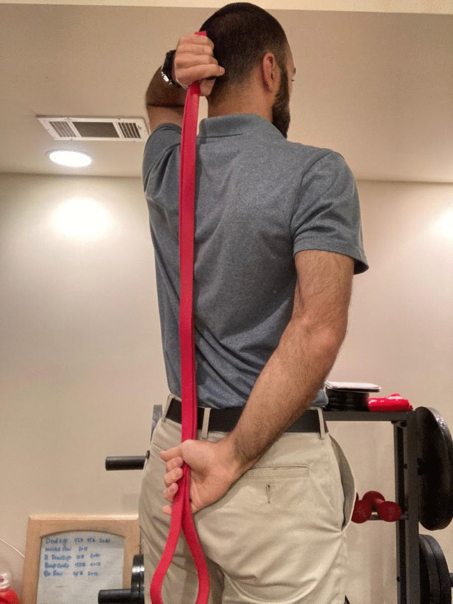 Active-assisted range of motion exercise with a superband to restore mobility, reduce pain, and improve strength against gravity.