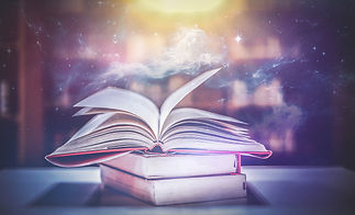 Imagine a picture book of an ancient book opened on a wooden table with a sparkling golden