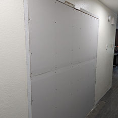 Hallway drywall panel newly installed in Payson
