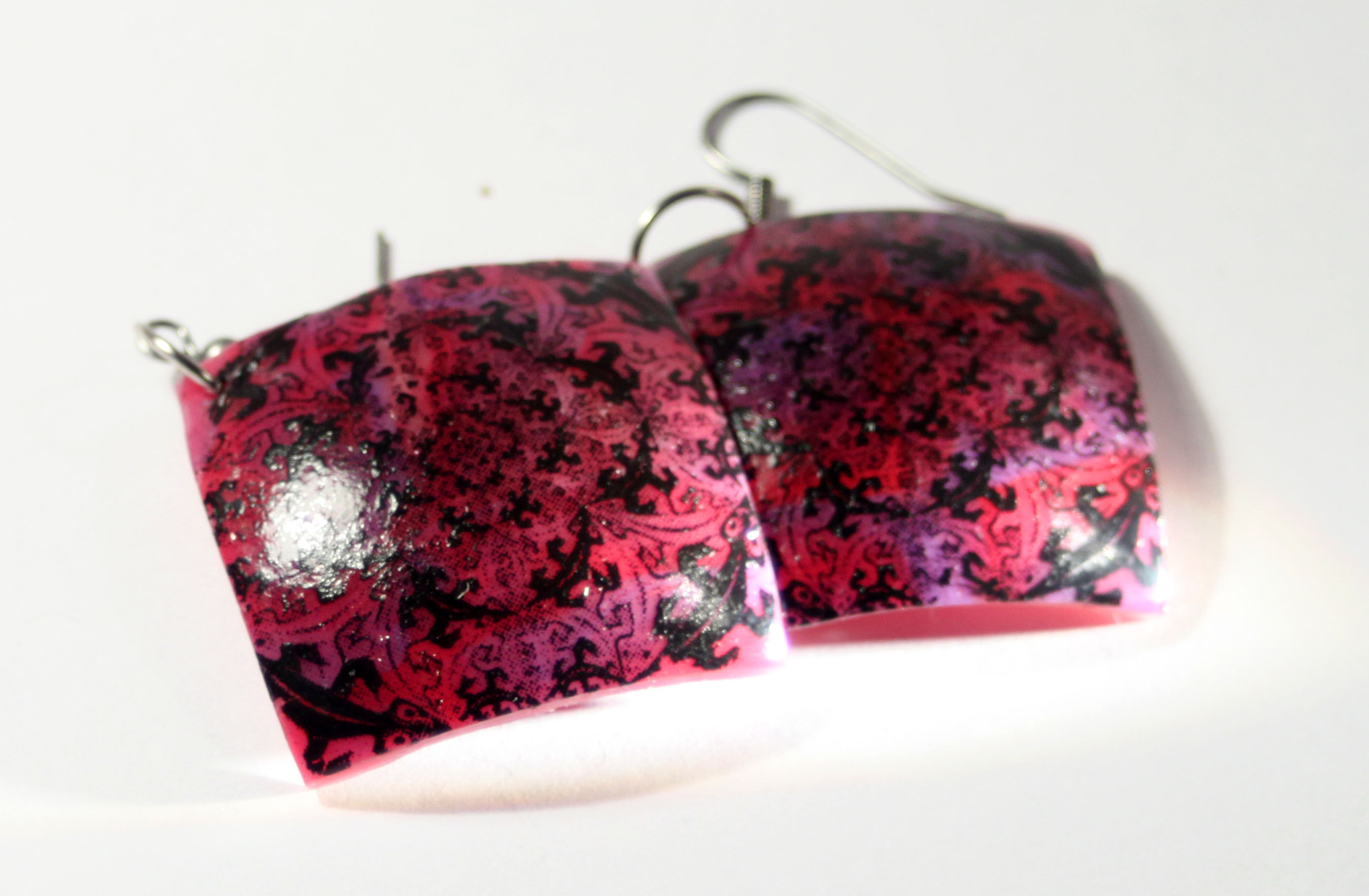 Ornamenting purple squer earings