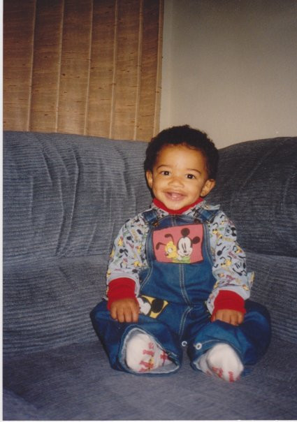 Little me on our family couch