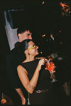 couple drinking and dancing at wedding
