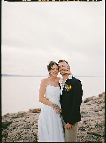 bride and groom in trendy wedding outfits at sunset in Ibiza