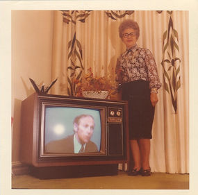 "To Clara and Teddy, This is our new TV. It looks and plays beautiful," signed "With love always, Debbie." Message is on back, 1972.