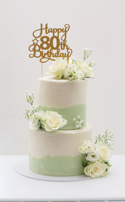 tall two tier sage buttercream topper fresh flowers