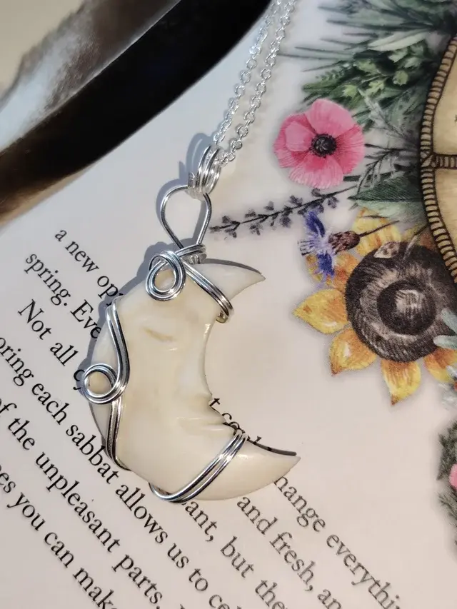 Thumbnail: Nightwhisper – Carved Bone Crescent Moon Pendant in Silver Filled Copper