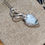 Thumbnail: Sistermoon Rainbow Moonstone Pendant – Goddess Rooted Collection 