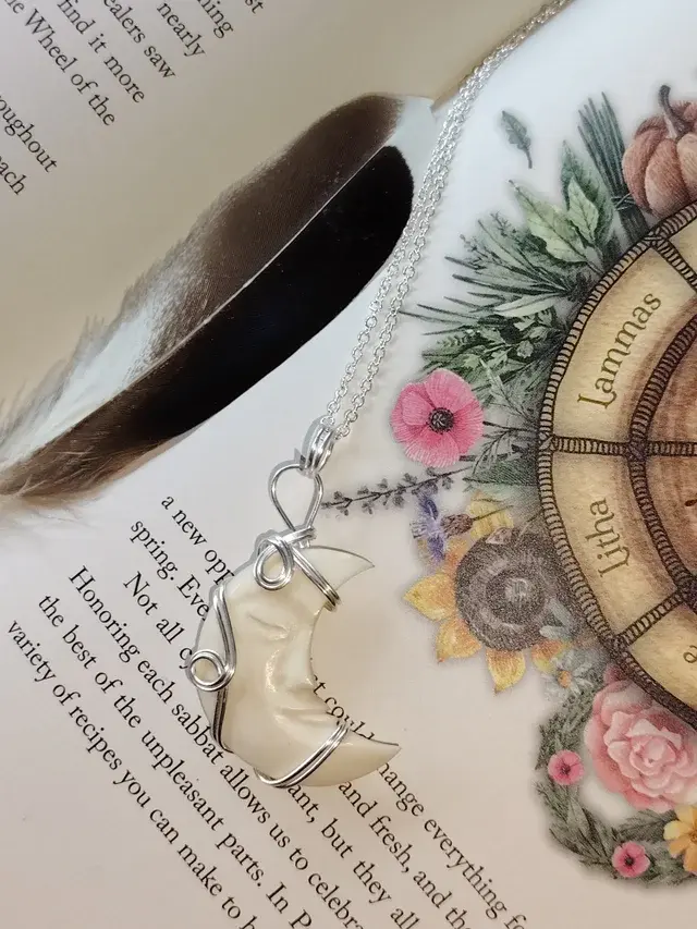 Thumbnail: Nightwhisper – Carved Bone Crescent Moon Pendant in Silver Filled Copper