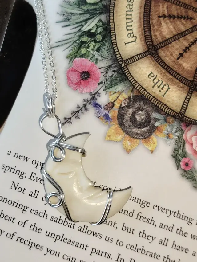 Thumbnail: Nightwhisper – Carved Bone Crescent Moon Pendant in Silver Filled Copper