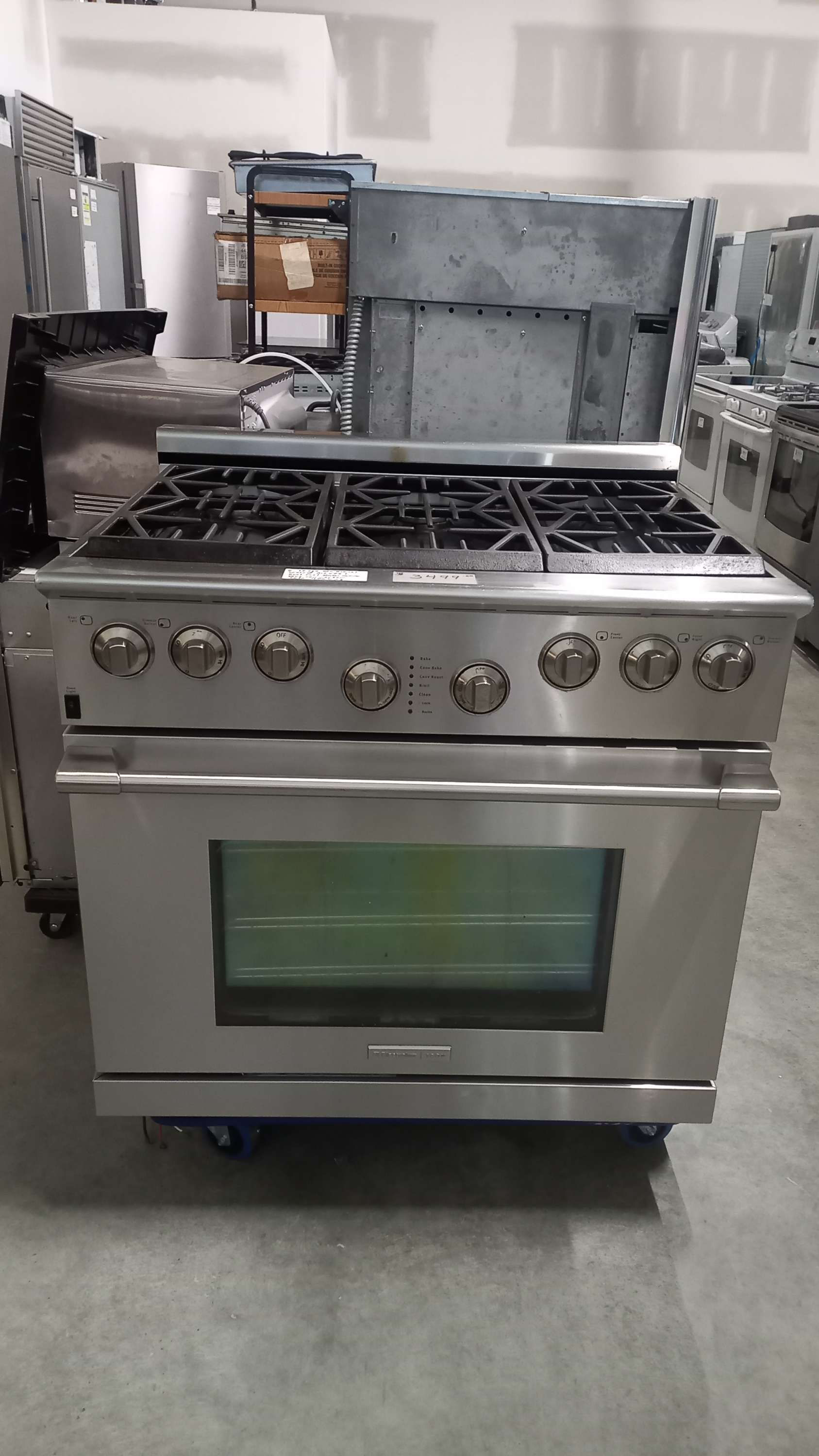 #20     36" six burner gas Top electric convection self clean oven 