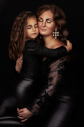 mother and daughter with closed eyes portrait, from vilija skubute motherhood portrait session, manchester.