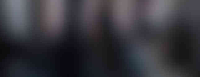 cats sitting in door of RV looking out