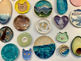 Whimsical ring dishes laid out on a table