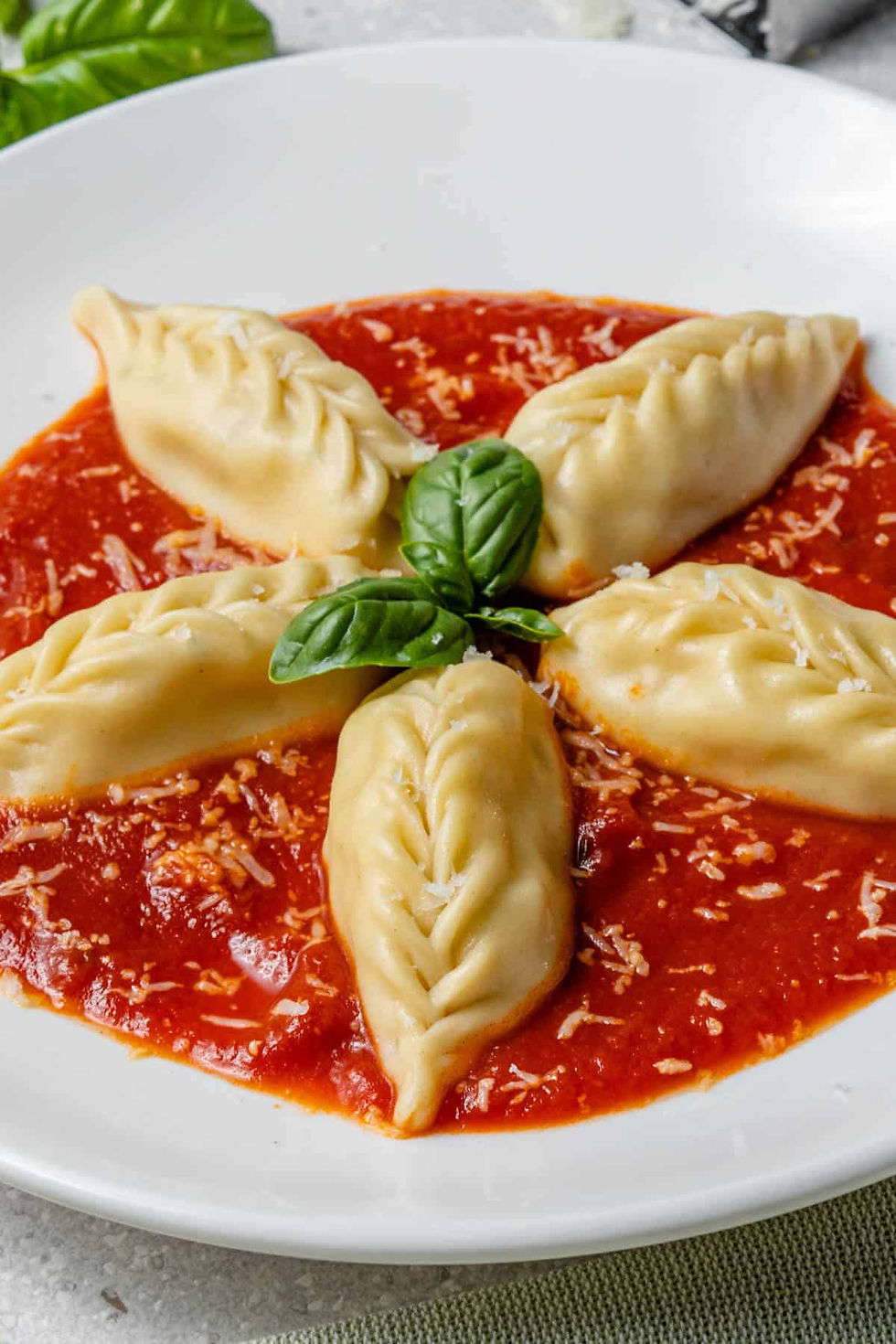 Handmade Sardinian culurgiones pasta filled with potatoes, pecorino cheese, and mint
