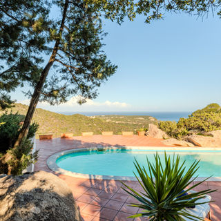 Private pool view toward Piccolo Pevero bay from Villa Esmerea