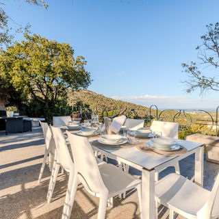 Outdoor terrace dining table at Villa Esmerea, Porto Cervo