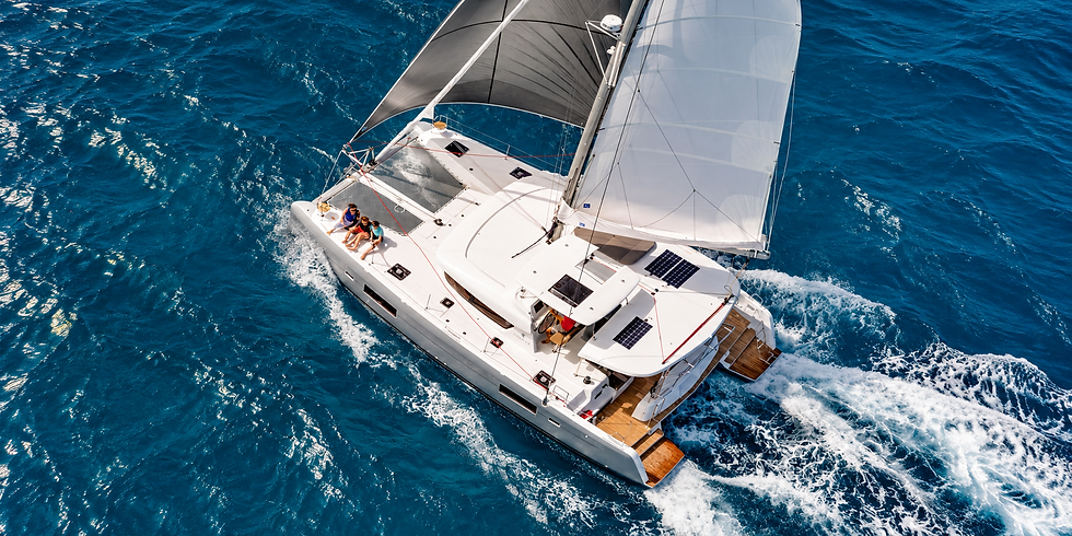 Luxury Catamaran Sailing Through Blue Waters.png