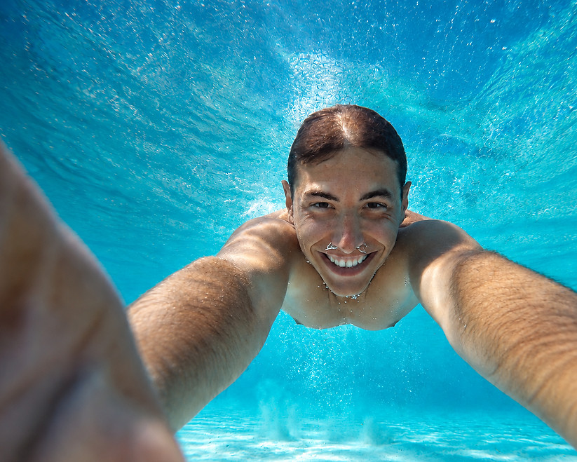 Joyful Underwater Selfie in Turquoise Water_edited.jpg
