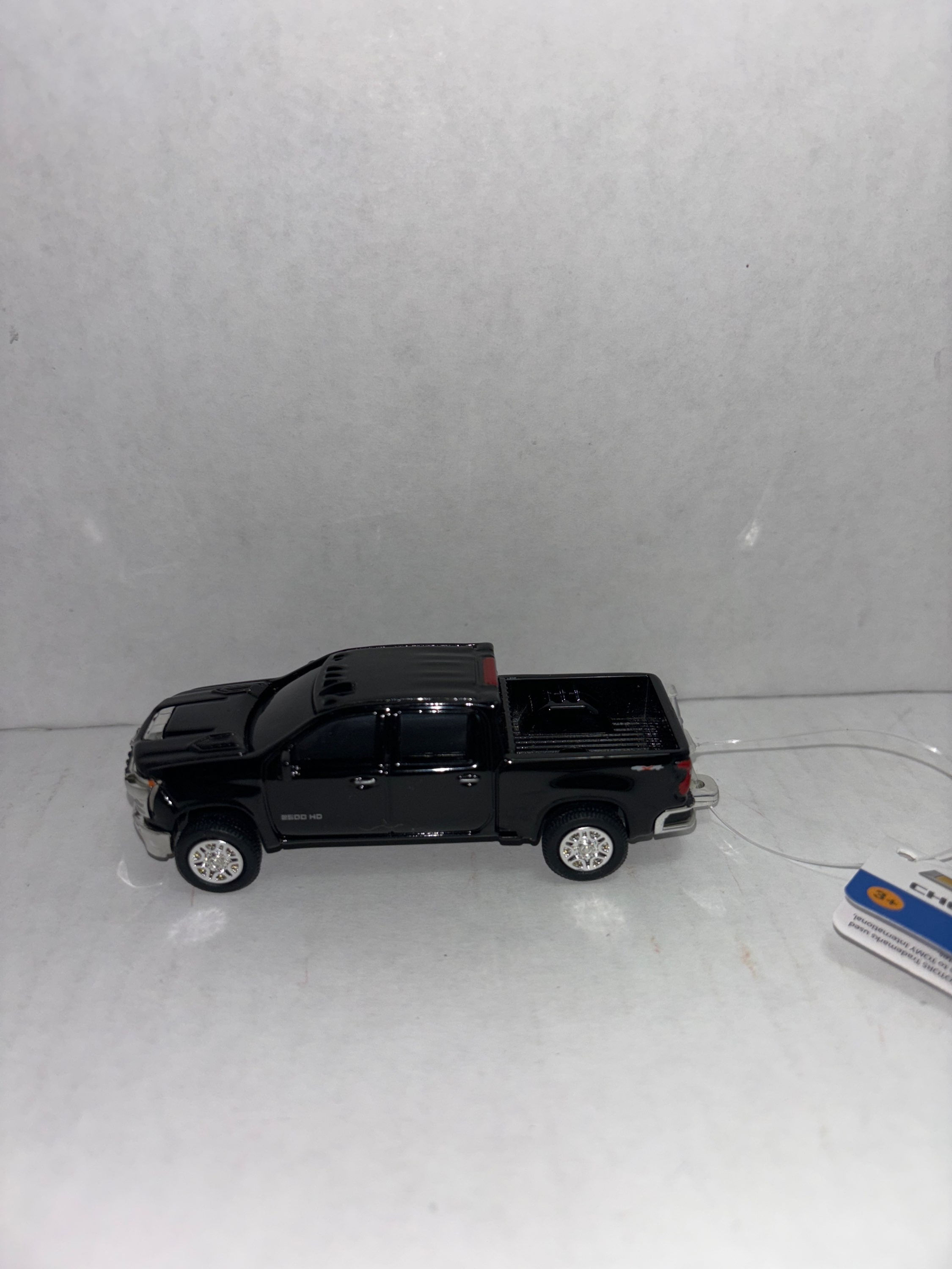 1/64 Ertl Black Chevy 2500HD 