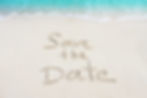 Save The Date handwritten on sand, beach