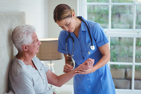 nurse-examining-senior-man.jpg