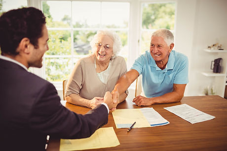 businessman-senior-man-handshaking-home.