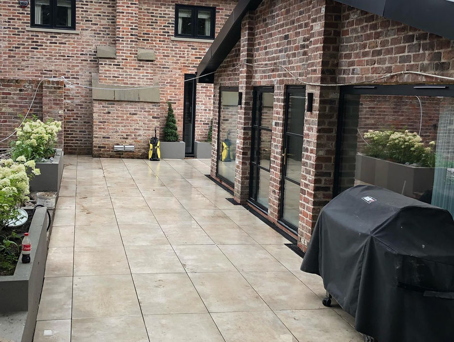 paving slabs next to a pool annex