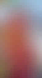 A father giving his young son a piggyback ride at the Delmont Daze festival. The father is wearing a red striped shirt and sunglasses, and the boy, who is on his shoulders, is wearing a red shirt, orange shorts, sunglasses, and a 'Junior Ranger' bucket hat.