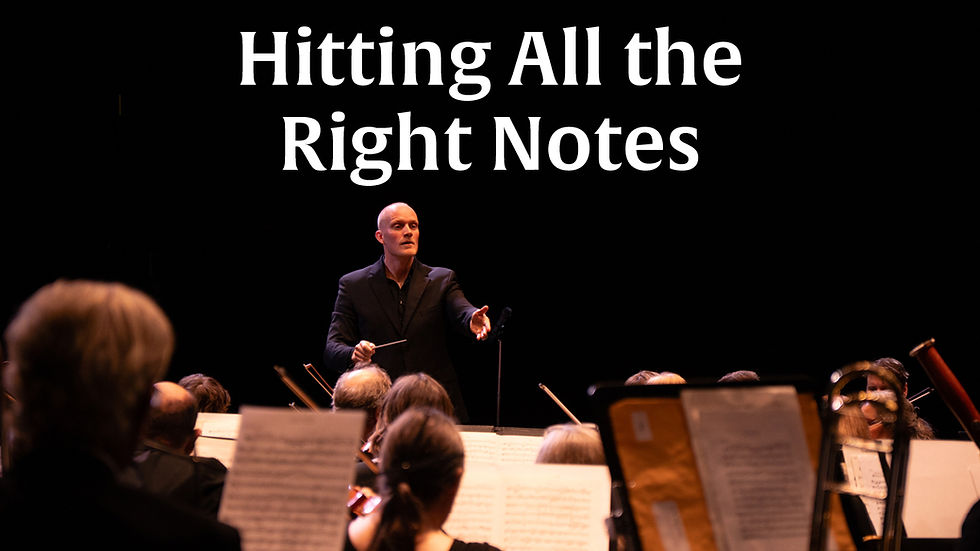 The title "Hitting All the Right Notes" is written in large white text against a black background. Below the text is a medium shot of a bald conductor in a dark suit standing on a dark stage, leading an orchestra with one arm outstretched and a baton in hand. The backs of musicians and their music stands are visible in the foreground.