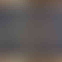 A close-up of a rectangular commemorative bronze plaque with a textured black background and raised gold lettering. The text reads: "PETERS TOWNSHIP PUBLIC SCHOOL, ERECTED A.D. 1926." It lists the Board of Education members: John H. Cheeseman (President), H.C. Caseber (Sec'y), E.E. Bebout, J. Ralph Johnston, and John J. McDowell. The bottom section credits Conrad C. Compton as the Registered Architect from Donora, PA, and Harris Construction Company as the Contractors from California, PA. The plaque is mounted with four dark screws in the corners.