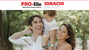 Ignacio de Elia smiling outside with his wife and young son sitting on his shoulders, beneath a feature article header titled "PRO-file: IGNACIO de ELIA."