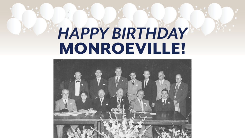 A celebratory graphic with a cream to light grey gradient background. At the top, there is a decorative border of various white balloons with strings. Centered below the balloons is the text "HAPPY BIRTHDAY MONROEVILLE!" in bold, dark blue capital letters, arranged on two lines. Below the text is a faded, black and white group photograph showing 13 people, mostly men in suits and one woman, seated and standing behind a long table with large floral arrangements.
