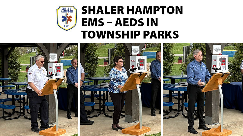 A graphic banner titled "SHALER HAMPTON EMS – AEDs IN TOWNSHIP PARKS" appearing next to the Shaler Hampton EMS logo. Below the text is a triptych of three people speaking at a wooden lectern under a park pavilion, with white, wall-mounted AED cabinets visible behind them.