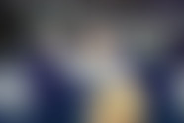 Professional pickleball player Sofia Sewing, wearing a white top and visor and a tan skirt, hits a backhand drive shot during the Pro Women's Singles finals match against Katerina Stewart.